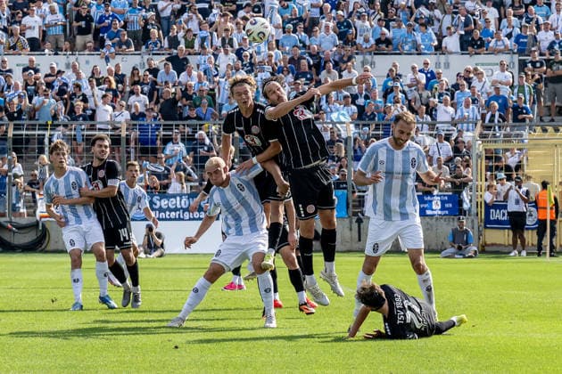 Fynn Heinze (TSV 1882 Landsberg), 13, and David Bauer (TSV 1882 Landsberg), 29, vs. Lasse Fassmann (TSV 1860 Munich), 33, and Michael Eberwein (TSV 1860 Munich), 13, GER, TSV 1860 Munich vs. TSV Landsberg 1882, Soccer, Bavarian Regional League, Matchday 6, 2026–2027 Season, August 30, 2026 DFL and DFB regulations prohibit any use of photographs as image sequences and or quasi-video. Photo: HMB Media, Heike Feiner Copyright: HMBxMedia HeikexFeiner