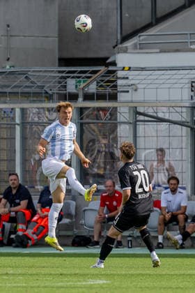 Julian Bell (TSV 1860 Munich), No. 02 heading the ball, with Leon Bucher (TSV 1882 Landsberg), No. 20, in front of him, GER, TSV 1860 Munich vs. TSV Landsberg 1882, soccer, Bavarian Regional League, Matchday 6, 2026–2027 season, August 30, 2026 DFL DFB regulations prohibit any use of photographs as image sequences and or quasi-video. Photo: HMB Media, Heike Feiner Copyright: HMBxMedia HeikexFeiner