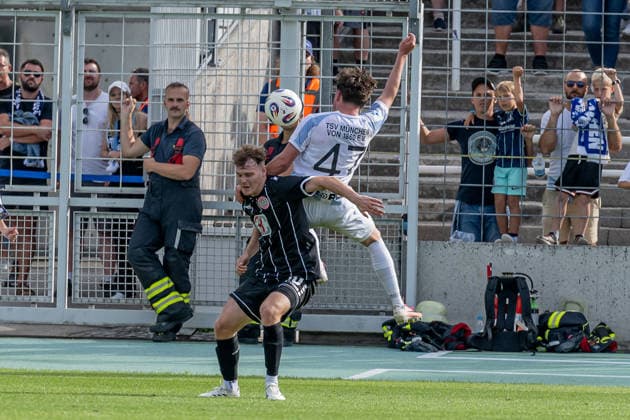 Battle for the Ball: Tackle between Leon Bucher (TSV 1882 Landsberg, 20) and Lance Fiedler (TSV 1860 Munich, 47), GER, TSV 1860 Munich vs. TSV Landsberg 1882, Soccer, Bavarian Regional League, Matchday 6, 2026–2027 season, August 30, 2026 DFL and DFB regulations prohibit any use of photographs as image sequences and or quasi-video. Photo: HMB Media, Heike Feiner Copyright: HMBxMedia HeikexFeiner