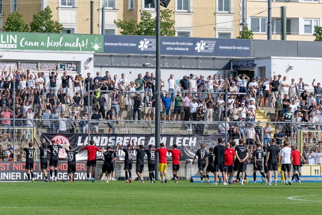 The Landsberg players are rightly being celebrated by the large contingent of fans who traveled with them for earning a point. GER, TSV 1860 Munich vs. TSV Landsberg 1882, Soccer, Bavarian Regional League, Matchday 6, 2026–2027 Season, August 30, 2026. DFL and DFB regulations prohibit any use of photographs as image sequences and or quasi-video. Photo: HMB Media, Heike Feiner Copyright: HMBxMedia HeikexFeiner