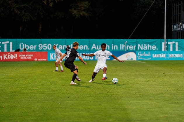Germany Men s Soccer 3rd Division 2026–2027, Matchday 3: FC Viktoria Köln vs. SC Preußen Münster; Cologne s Wesley Adeh (SC Preußen Münster) and Tim Kloss (FC Viktoria Köln) in a tackle during the match; 18 Copyright: xThiemoxRudolphx