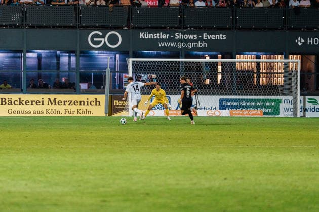 Germany Men s Soccer 3rd Division 2026–2027, Matchday 3: FC Viktoria Köln vs. SC Preußen Münster—Cologne misses a scoring chance, one-on-one, Charalambos Makridis (SC Preußen Münster), 14 Copyright: xThiemoxRudolphx