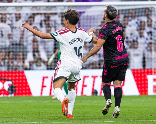 ESP Real Madrid CF vs. Málaga CF La Liga EA Sports Arda Güler of Real Madrid is defended by Ramón Enríquez during the La Liga EA Sports match between Real Madrid and Málaga CF at Estadio Santiago Bernabéu on August 30, 2026, in Madrid, Spain Madrid Madrid Spain Soccer Copyright: xAlejandroxMatiasx