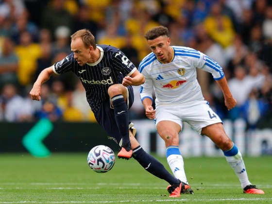 Leeds, England, 30th August 2026. Mikkel Damsgaard of Brentford and Ethan Ampadu of Leeds United during the Leeds United vs Brentford Premier League match at Elland Road, Leeds. Picture credit should read: James Baylis Sportimage EDITORIAL USE ONLY. No use with unauthorised audio, video, data, fixture lists, club league logos or live services. Online in-match use limited to 120 images, no video emulation. No use in betting, games or single club league player publications. SPI_062_JB_LEEDS_BRENTFORD SPI-4950-0062