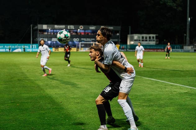Germany Men s Soccer 3rd Division 2026–2027, Matchday 3: FC Viktoria Köln vs. SC Preußen Münster, Cologne: Pascal Armando Fallmann (FC Viktoria Köln), 28th minute, tackle, holding, against Antonio Tikvic (SC Preußen Münster), 4th minute Copyright: xThiemoxRudolphx