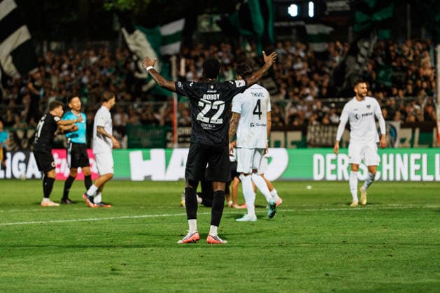 Germany Men s Soccer 3rd Division 2026–2027, Matchday 3: FC Viktoria Köln vs. SC Preußen Münster; Köln: Verthomy, Schild, Boboy; FC Viktoria Köln, No. 22, protests after a goal is disallowed; free kick; referee Ryo Tanimoto (Japan), FIFA Referee Copyright: xThiemoxRudolphx