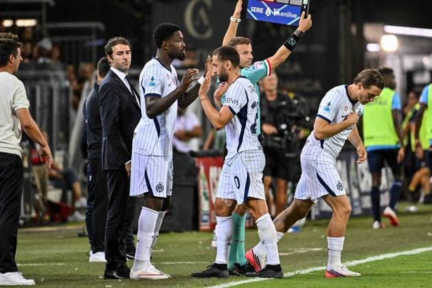 IPA87949790 - Hakan Calhanoglu of Inter and Marcus Thuram of Inter during the Cagliari Calcio vs. Inter - FC Internazionale Italian Serie A soccer match in Cagliari, Italy, on August 30, 2026  Copyright: xLuigixCanu IPAxSportx xx 87949790
