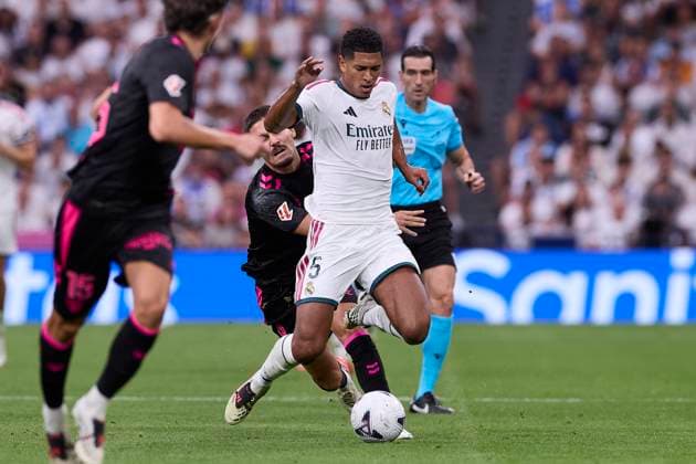 August 30, 2026, Madrid, Spain: Chupe (Malaga CF) and Jude Bellingham (Real Madrid CF) are seen in action during the LaLiga EA SPORTS 2026 2027 match between Real Madrid CF and Malaga CF.Final Score: Real Madrid CF 4-0 Malaga CF Madrid Spain - ZUMAs197 20260830_aaa_s197_235 Copyright: xFedericoxTitonex