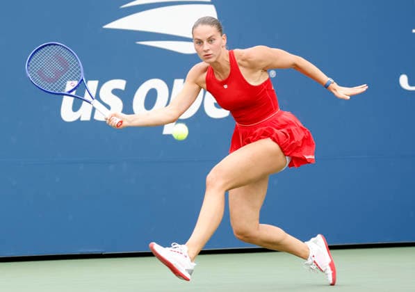 Marta Kostyuk of Ukraine returns a ball to Storm.Hunter of Australia before defeating her in straight sets on The Grandstand court in the first round at the 2026 US Open Tennis Championship at the USTA Billie Jean King National Tennis Center in New York City on Sunday, August 30, 2026.  NYP20260830115 JOHNxANGELILLO