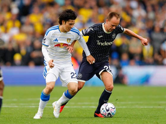 Leeds, England, 30th August 2026. Ao Tanaka of Leeds United and Mikkel Damsgaard of Brentford during the Leeds United vs Brentford Premier League match at Elland Road, Leeds. Picture credit should read: James Baylis Sportimage EDITORIAL USE ONLY. No use with unauthorised audio, video, data, fixture lists, club league logos or live services. Online in-match use limited to 120 images, no video emulation. No use in betting, games or single club league player publications. SPI_141_JB_LEEDS_BRENTFORD SPI-4950-0141