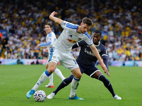 Leeds, England, 30th August 2026. Anton Stach of Leeds United and Michael Kayode of Brentford during the Leeds United vs Brentford Premier League match at Elland Road, Leeds. Picture credit should read: James Baylis Sportimage EDITORIAL USE ONLY. No use with unauthorised audio, video, data, fixture lists, club league logos or live services. Online in-match use limited to 120 images, no video emulation. No use in betting, games or single club league player publications. SPI_160_JB_LEEDS_BRENTFORD SPI-4950-0160