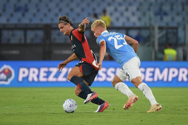 IPA87953457 - Genoa s Lorenzo Colombo battles for the ball with Lazio s Oliver Provstgaard during the 2026–2027 Serie A match between SS Lazio and Genoa CFC at the Olympic Stadium in Rome on August 30, 2026.  Copyright: xFabrizioxCorradetti IPAxSportx xx 87953457