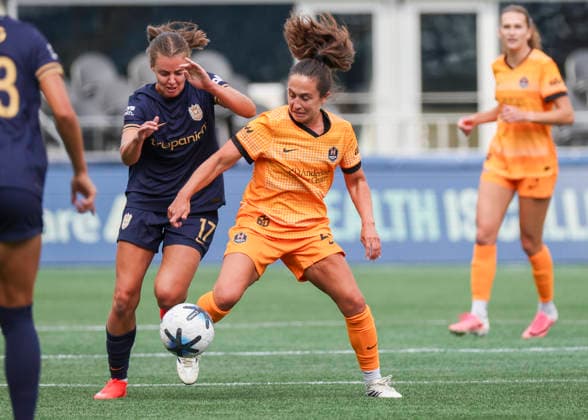 SEATTLE, WA - AUGUST 30: (left to right) Seattle Reign FC midfielder Sally Menti (17) challenges Houston Dash midfielder Danielle Colaprico (24) for the ball in the first half during the NWSL match between the Houston Dash and Seattle Reign on August 30, 2026 at Lumen Field in Seattle, Washington. (Photo by Leslie Plaza Johnson Icon Sportswire) SOCCER: AUG 30 NWSL Seattle Reign FC vs Houston Dash EDITORIAL USE ONLY Icon260830006