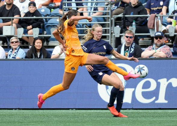 SEATTLE, WA - AUGUST 30: (left to right) Houston Dash defender Natalie Bain (8) kicks the ball away from Seattle Reign FC midfielder Angharad James-Turner (8) in the second half during the NWSL match between the Houston Dash and Seattle Reign FC on August 30, 2026 at Lumen Field in Seattle, Washington. (Photo by Leslie Plaza Johnson Icon Sportswire) SOCCER: AUG 30 NWSL Seattle Reign FC vs Houston Dash EDITORIAL USE ONLY Icon260830022