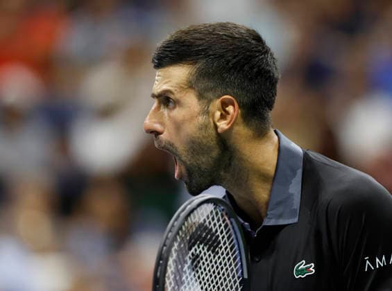 Novak Djokovic of Serbia reacts after a point in the 3rd set of his match against Mariano Navone of Argentina in Arthur Ashe Stadium in the first round at the 2026 US Open Tennis Championship at the USTA Billie Jean King National Tennis Center in New York City on Sunday, August 30, 2026.  NYP20260830145 JOHNxANGELILLO