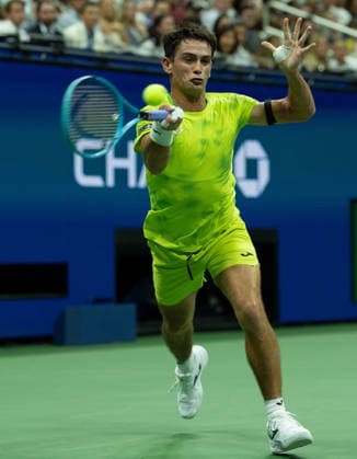 2026 US Open - Day 1 NEW YORK, NEW YORK - AUGUST 30: Mariano Navone of Argentina returns a shot during his match against Novak Djokovic of Serbia during the 2026 US Open - Day 1 at USTA Billie Jean King National Tennis Center on August 30, 2026 in New York, New York. New York USTA Billie Jean King National Tennis Center New York United States Copyright: xSusanxMullane ISIxPhotosx 9746