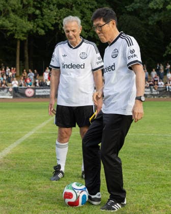 FC Nieder Florstadt U40 vs. Eintracht Frankfurt Legends Team, Eintracht’s Cha Bum Kun performing the ceremonial kickoff for the match. In the background, captain Karl Heinz Charly Körbel. Match featuring Eintracht Frankfurt’s Legends Team at FC Nieder Florstadt on August 28, 2026, Florstadt, Hesse, Germany, at the Nieder Florstadt Forest Sports Field.