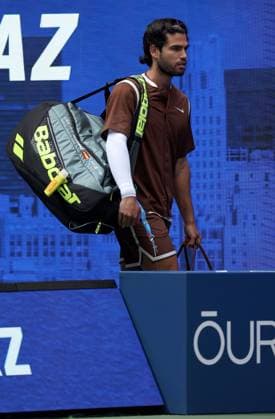 Carlos Alcaraz of Spain enters court 2026 US Open, Day Two, USTA Billie Jean King National Tennis Center, New York, USA - 31 Aug 2026New York USTA Billie Jean King National T New York (NY) United States of America EDITORIAL USE ONLY No use with unauthorised audio, video, data, fixture lists, club league logos or live services. Online in-match use limited to 120 images, no video emulation. No use in betting, games or single club league player publications.  Copyright: xEllaxLing Shutterstockx 17124549i