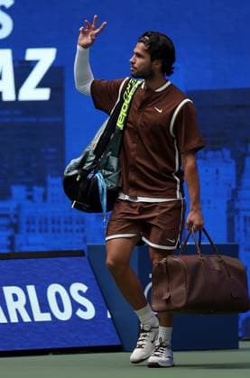 Carlos Alcaraz of Spain enters court 2026 US Open, Day Two, USTA Billie Jean King National Tennis Center, New York, USA - 31 Aug 2026New York USTA Billie Jean King National T New York (NY) United States of America EDITORIAL USE ONLY No use with unauthorised audio, video, data, fixture lists, club league logos or live services. Online in-match use limited to 120 images, no video emulation. No use in betting, games or single club league player publications.  Copyright: xEllaxLing Shutterstockx 17124549c