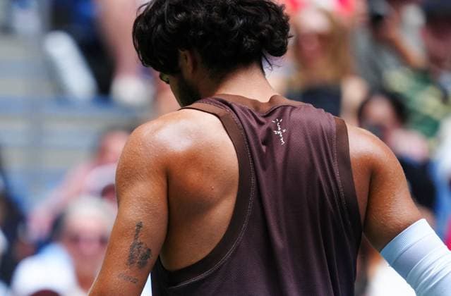 Carlos Alcaraz with a tattoo marking his first US Open win in 2022 2026 US Open, Day Two, USTA Billie Jean King National Tennis Center, New York, USA - 31 Aug 2026New York USTA Billie Jean King National T New York (NY) United States of America EDITORIAL USE ONLY No use with unauthorised audio, video, data, fixture lists, club league logos or live services. Online in-match use limited to 120 images, no video emulation. No use in betting, games or single club league player publications.  Copyright: xJavierxGarcia Shutterstockx 17124548w