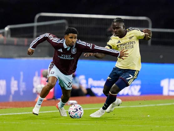 Birmingham, England, 31st August 2026. Ian Maatsen of Aston Villa tussles with Bukayo Saka of Arsenal during the Aston Villa vs Arsenal Premier League match at Villa Park, Birmingham. Picture credit should read: Andrew Yates Sportimage EDITORIAL USE ONLY. No use with unauthorised audio, video, data, fixture lists, club league logos or live services. Online in-match use limited to 120 images, no video emulation. No use in betting, games or single club league player publications. SPI_017_AY_Villa_Arsenal SPI-4946-0017