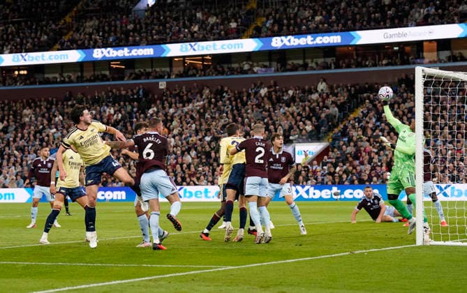 Birmingham, England, 31st August 2026. Zion Suzuki of Aston Villa saves a header from Declan Rice of Arsenal during the Aston Villa vs Arsenal Premier League match at Villa Park, Birmingham. Picture credit should read: Andrew Yates Sportimage EDITORIAL USE ONLY. No use with unauthorised audio, video, data, fixture lists, club league logos or live services. Online in-match use limited to 120 images, no video emulation. No use in betting, games or single club league player publications. SPI_026_AY_Villa_Arsenal SPI-4946-0026