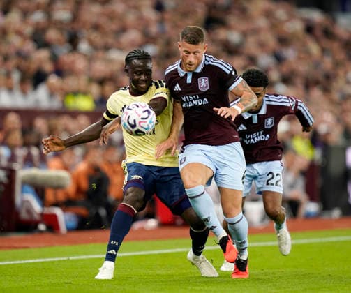 Birmingham, England, 31st August 2026. Bukayo Saka of Arsenal tackled by Ross Barkley of Aston Villa during the Aston Villa vs Arsenal Premier League match at Villa Park, Birmingham. Picture credit should read: Andrew Yates Sportimage EDITORIAL USE ONLY. No use with unauthorised audio, video, data, fixture lists, club league logos or live services. Online in-match use limited to 120 images, no video emulation. No use in betting, games or single club league player publications. SPI_032_AY_Villa_Arsenal SPI-4946-0032