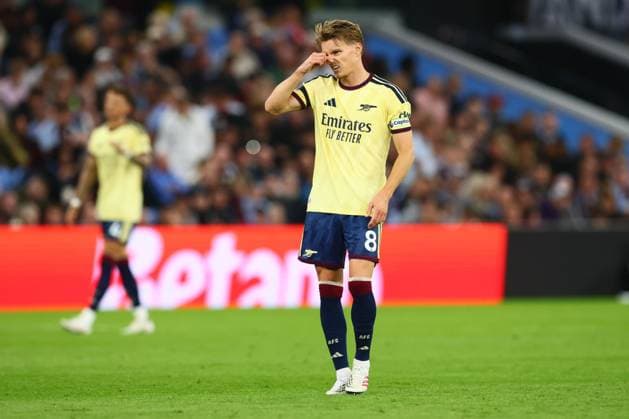 Martin Odegaard of Arsenal looks dejected during the game Aston Villa v Arsenal, Premier League Football, Football, Villa Park, Birmingham, UK - 31 Aug 2026Birmingham Villa Park United Kingdom EDITORIAL USE ONLY No use with unauthorised audio, video, data, fixture lists, club league logos or live services. Online in-match use limited to 120 images, no video emulation. No use in betting, games or single club league player publications. Copyright: xPaulxCurrie Shutterstockx 17126356ae