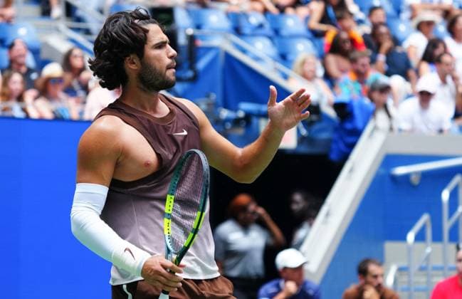 The revealing shirt of Carlos Alcaraz designed by Travis Scott 2026 US Open, Day Two, USTA Billie Jean King National Tennis Center, New York, USA - 31 Aug 2026New York USTA Billie Jean King National T New York (NY) United States of America EDITORIAL USE ONLY No use with unauthorised audio, video, data, fixture lists, club league logos or live services. Online in-match use limited to 120 images, no video emulation. No use in betting, games or single club league player publications. Copyright: xJavierxGarcia Shutterstockx 17124548at