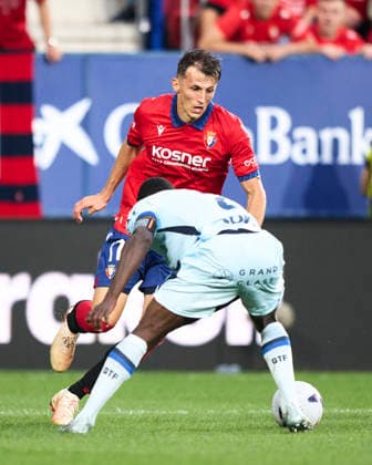 CA Osasuna v Getafe CF - LaLiga EA Sports 2026 27 Ante Budimir of CA Osasuna duels for the ball with Djene Dakonam of Getafe CF during the LaLiga EA Sports match between CA Osasuna and Getafe CF at Estadio El Sadar in Pamplona, Spain, on August 31, 2026. Pamplona Spain  Copyright: xCesarxOrtizxGonzalezx originalFilename:ortizgonzalez-caosasun260831_npC3s.jpg