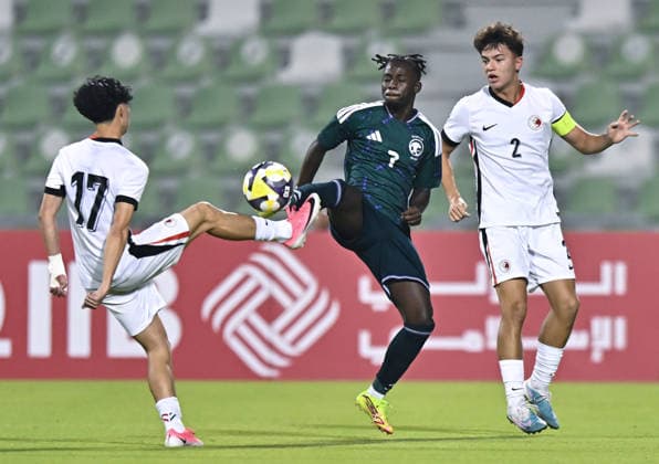 Saudi Arabia V Hong Kong, China - AFC U20 Asian Cup China 2027 Qualifiers Suhayb Alhawsawi (C) of Saudi Arabia and Ryan Fok of Hong Kong, China compete during the AFC U20 Asian Cup China 2027 Qualifiers match between Saudi Arabia V Hong Kong, China at Hamad Bin Khalifa Stadium in Doha, Qatar, on August 31, 2026. DOHA Qatar Copyright: xNOUSHADx