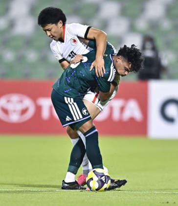 Saudi Arabia V Hong Kong, China - AFC U20 Asian Cup China 2027 Qualifiers Talal Ibrahim S Harthi (R) of Saudi Arabia and Jing Yung Chun of Hong Kong, China compete during the AFC U20 Asian Cup China 2027 Qualifiers match between Saudi Arabia V Hong Kong, China at Hamad Bin Khalifa Stadium in Doha, Qatar, on August 31, 2026. DOHA Qatar Copyright: xNOUSHADx