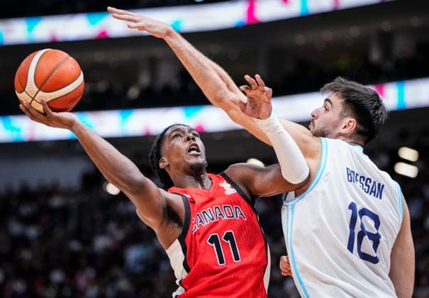 August 31, 2026, Quebec City, Pq, Canada: Canada s Marcus Carr (11) takes a shot as Argentina s Gonzalo Bressan (18) defends during their FIBA world cup qualification action in Quebec City, Monday, Aug.Ã‚ 31, 2026. Marcus Carr (11) Gonzalo Bressan (18)  - ZUMAc35_ 20260831_zaf_c35_084 Copyright: xMathieuxBelangerx