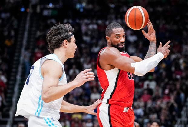 August 31, 2026, Quebec City, Pq, Canada: Canada s Khem Birch (92) passes the ball beside Argentina s Francisco Caffaro (1) during their FIBA world cup qualification action in Quebec City, Monday, Aug.Ã‚ 31, 2026. Francisco Caffaro (1) Khem Birch (92)  - ZUMAc35_ 20260831_zaf_c35_091 Copyright: xMathieuxBelangerx