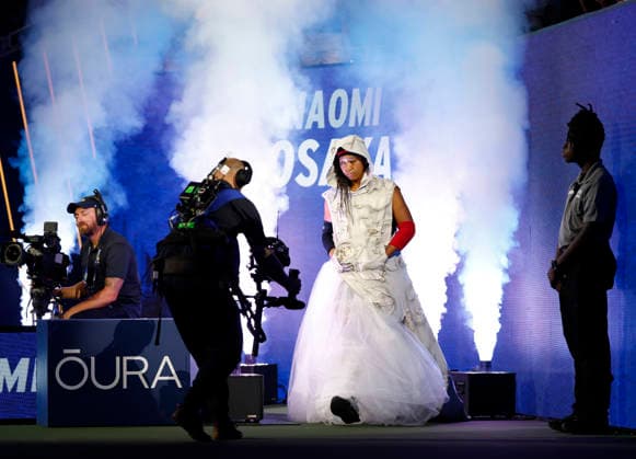 Naomi Osaka of Japan makes her entrance when she is introduced before her first round match against Anastasia.Zakharova in Arthur Ashe Stadium at the 2026 US Open Tennis Championship at the USTA Billie Jean King National Tennis Center in New York City on Monday, August 31, 2026.  NYP20260831142 JOHNxANGELILLO