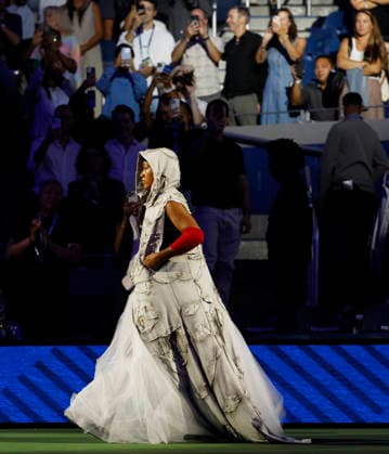 Naomi Osaka of Japan makes her entrance when she is introduced before her first round match against Anastasia.Zakharova in Arthur Ashe Stadium at the 2026 US Open Tennis Championship at the USTA Billie Jean King National Tennis Center in New York City on Monday, August 31, 2026.  NYP20260831144 JOHNxANGELILLO