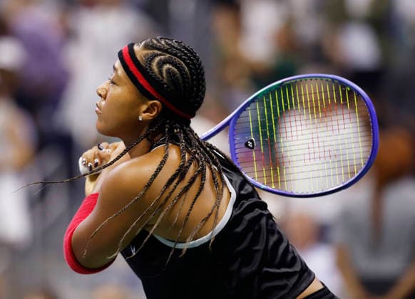 Naomi Osaka of Japan warms up after making her entrance when she is introduced before her first round match against Anastasia Zakharova in Arthur Ashe Stadium at the 2026 US Open Tennis Championship at the USTA Billie Jean King National Tennis Center in New York City on Monday, August 31, 2026.  NYP20260831147 JOHNxANGELILLO