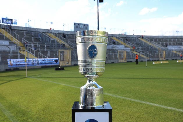 Soccer, Men s, Toto Cup, Quarterfinals, 2026–2027 Season, TSV 1860 Munich vs. TSV Buchbach at Grünwalder Stadium. Here is the Toto Cup, the trophy for the winner of the BFV Toto Cup, standing in front of the Westkurve.
