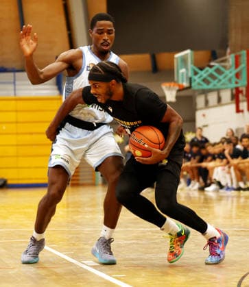 September 1, 2026, Germany, Ludwigsburg, Basketball: MHP Riesen Ludwigsburg vs. Frankfurt Slyliners; from left: William Christmas (Frankfurt), Justin Kier (LB),