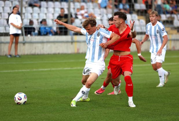 Soccer, Men s, Toto Cup, Quarterfinals, 2026–2027 Season, TSV 1860 Munich vs. TSV Buchbach at Grünwalder Stadium; Julian Bell (TSV 1860 Munich, left) and Faton Dzemailji (TSV Buchbach, right) battle for the ball