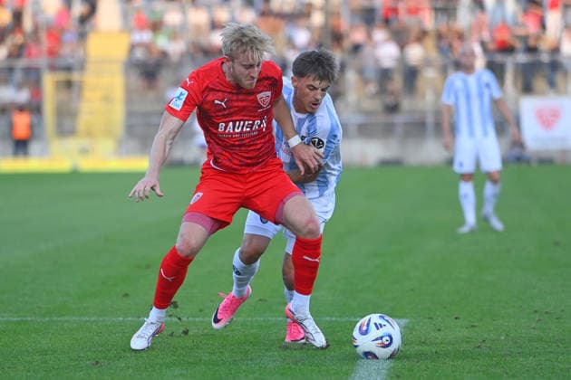 Jonas WESELSBERGER, Buchbach; Action; Tackle against Mark GEVORGYAN, TSV 1860 Munich, Bavarian State Soccer Cup, Toto Cup: TSV 1860 Munich vs. TSV Buchbach on September 1, 2026, at Grünwalder Stadium