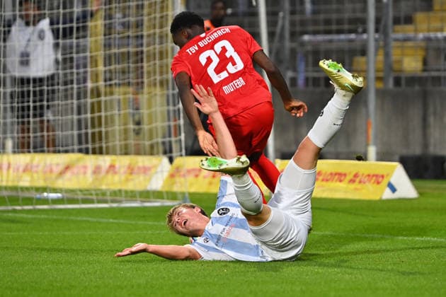 Daniel MUTEBA (Buchbach), Action, Tackle against Fabio WAGNER (TSV 1860 Munich), Foul leading to a penalty kick, Penalty kick, Penalty area play, Soccer, Bavarian State Cup, Toto Cup: TSV 1860 Munich vs. TSV Buchbach on September 1, 2026, at Grünwalder Stadium