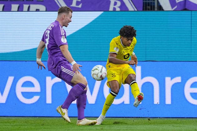 01.09.2026, xydrx, Fußball, DFB Pokal, HEBC Hamburg - Borussia Dortmund, Saison 2026 2027, Volksparkstadion: Christopher Gruenewald (HEBC Hamburg, 33) im Zweikampf gegen Mathis Albert (Borussia Dortmund, 41) DFB regulations prohibit any use of photographs as image sequences and or quasi-video. *** September 1, 2026, xydrx, Soccer, DFB Cup, HEBC Hamburg vs. Borussia Dortmund, 2026–2027 season, Volksparkstadion, Christopher Gruenewald (HEBC Hamburg), No. 33 in a tackle against Mathis Albert (Borussia Dortmund), No. 41. DFB regulations prohibit any use of photographs as image sequences and or quasi-video. Copyright: HMBxMedia YannisxDreimann