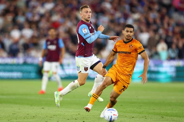 London, England, 1st September 2026. Jarrod Bowen of West Ham United and Andre of Wolverhampton Wanderers challenge for the ball during the West Ham United vs Wolverhampton Wanderers Sky Bet Championship match at the London Stadium, London. Picture credit should read: Paul Terry Sportimage EDITORIAL USE ONLY. No use with unauthorised audio, video, data, fixture lists, club league logos or live services. Online in-match use limited to 120 images, no video emulation. No use in betting, games or single club league player publications. SPI_031_PT_West_Ham_Wolves SPI-4952-0031