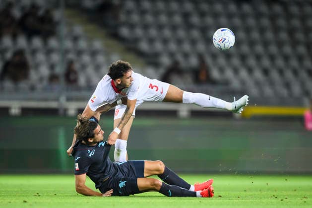 Torino FC v AC Monza - Coppa Italia Lorenzo Lucchesi of AC Monza competes for the ball with Sandro Kulenovic of Torino FC during the Coppa Italia football match between Torino FC and AC Monza. Turin Italy Copyright: xNicolòxCampox