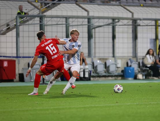 Soccer, Men s, Toto Cup, Round of 16, 2026–2027 Season, TSV 1860 Munich vs. TSV Buchbach at Grünwalder Stadium: Faton Dzemailji (TSV Buchbach, left) and Fabio Wagner (TSV 1860 Munich, right) battle for the ball
