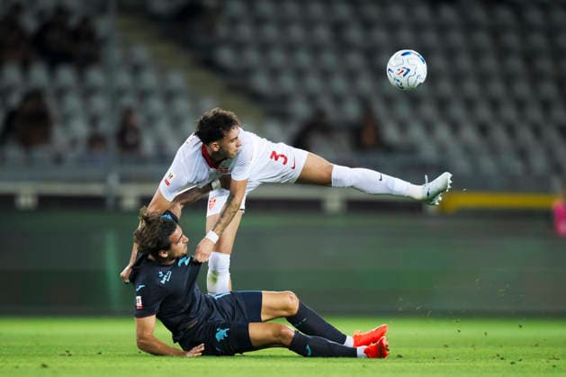 Torino FC v AC Monza - Coppa Italia Lorenzo Lucchesi of AC Monza competes for the ball with Sandro Kulenovic of Torino FC during the Coppa Italia football match between Torino FC and AC Monza. Turin Italy Copyright: xNicolòxCampox