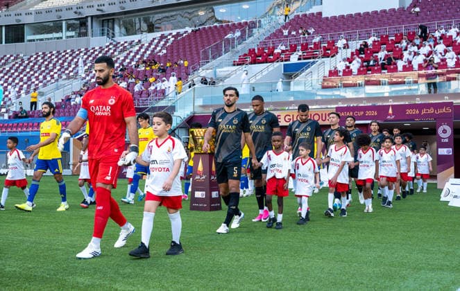 QATAR CUP 2026 SEMI-FINAL MATCH AL-SADD SC AND AL-GHARAFA SC Al-Sadd SC and Al-Gharafa SC players walk onto the pitch prior to the Qatar Cup 2026 semi-final match between Al-Sadd SC and Al-Gharafa SC at Khalifa International Stadium in Doha, Qatar, on September 1, 2026. DOHA Qatar Copyright: xNOUSHADx