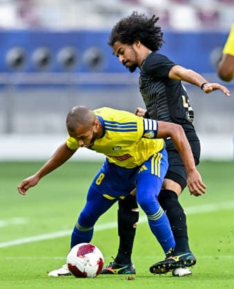 QATAR CUP 2026 SEMI-FINAL MATCH AL-SADD SC AND AL-GHARAFA SC Akram Hassan Afif (R) of Al Sadd SC and Yacine Brahimi Al-Gharafa SC compete during the Qatar Cup 2026 semi-final match between Al-Sadd SC and Al-Gharafa SC at Khalifa International Stadium in Doha, Qatar, on September 1, 2026. DOHA Qatar Copyright: xNOUSHADx