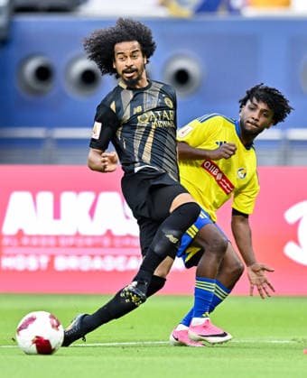 QATAR CUP 2026 SEMI-FINAL MATCH AL-SADD SC AND AL-GHARAFA SC Akram Hassan Afif (L) of Al Sadd SC and Amro Abdelfatah Surag of Al-Gharafa SC compete during the Qatar Cup 2026 semi-final match between Al-Sadd SC and Al-Gharafa SC at Khalifa International Stadium in Doha, Qatar, on September 1, 2026. DOHA Qatar Copyright: xNOUSHADx